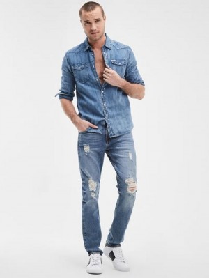 Guess Distressed Tapered Jeans Blauw | GUESS-SN30353