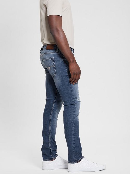 Guess Finnley Distressed Tapered Jeans Blauw | GUESS-SN30421