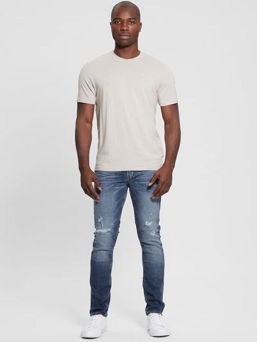 Guess Finnley Distressed Tapered Jeans Blauw | GUESS-SN30421